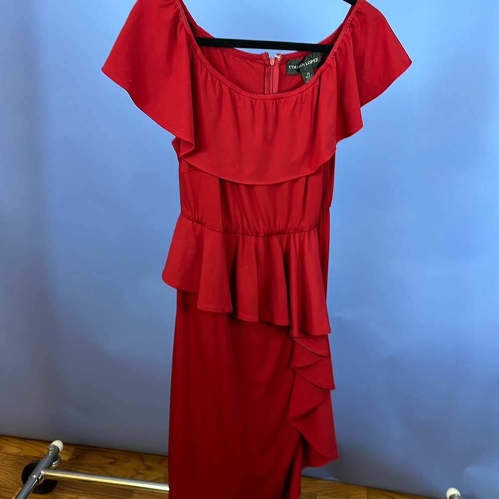 Colleen Lopez, red stretch jersey off the shoulder ruffle dress.